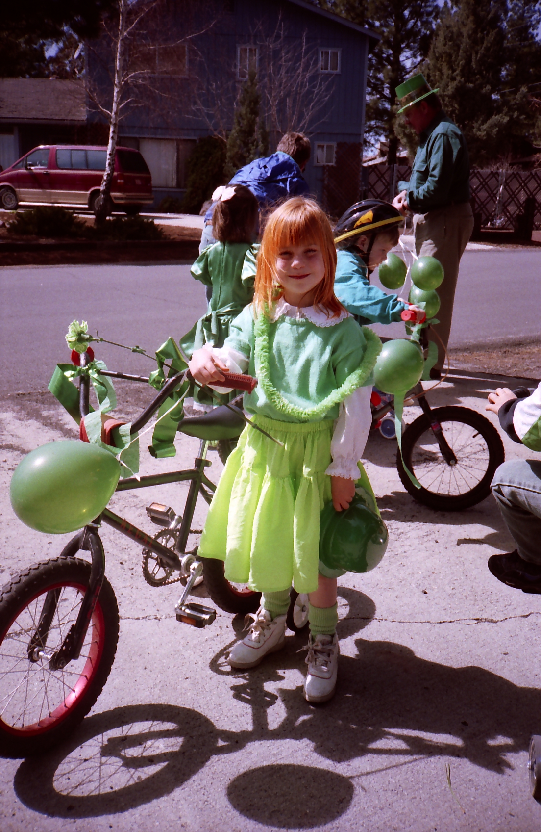 Sam stands next to her bike, ready to ride.